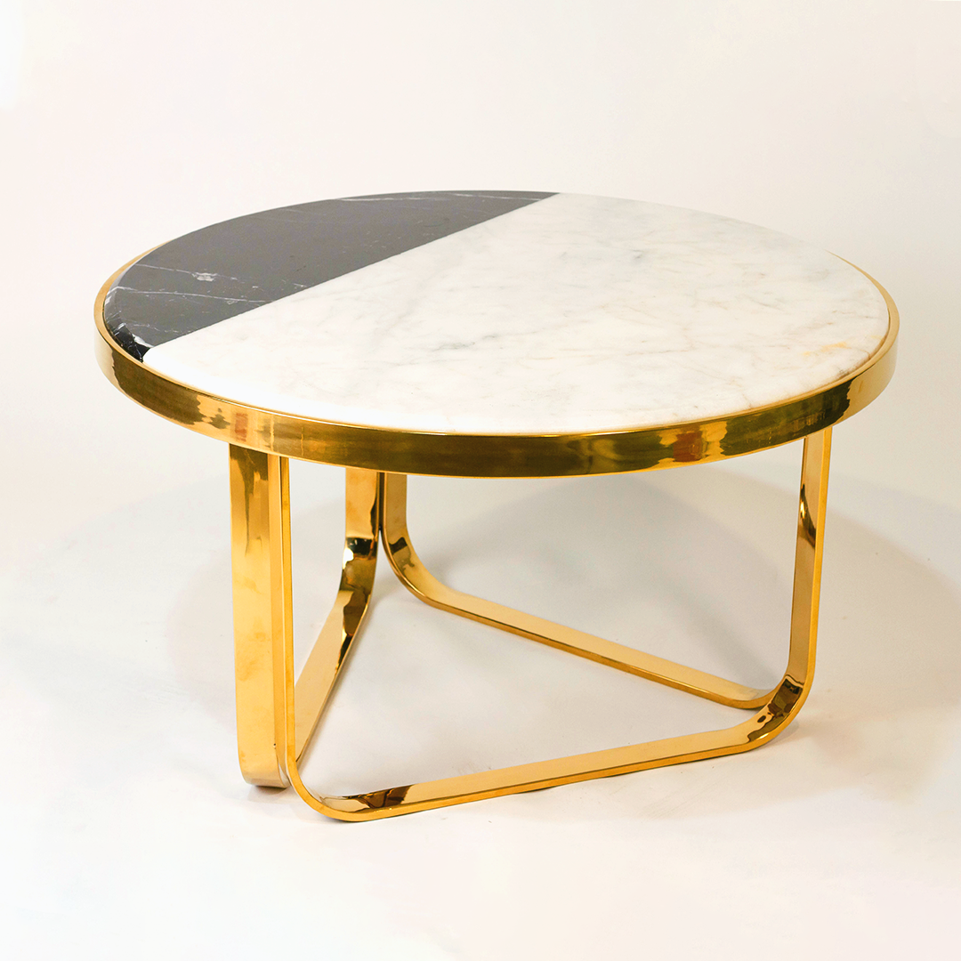 <img src="refined-curve-coffee-table.jpg" alt="Refined curve stainless steel coffee table – طاولة قهوة دائرية أنيقة من الاستانلس ستيل – تصميم مودرن بسطح زجاجي أو رخامي">